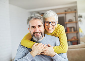 Couple smiling. Link to Life Stage Gift Planner Ages 45-65 Situations. Couple smiling. Link to Life Stage Gift Planner Ages 45-65 Situations.